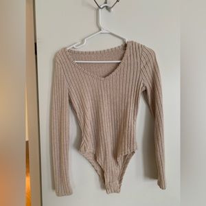 Soft beige body suit